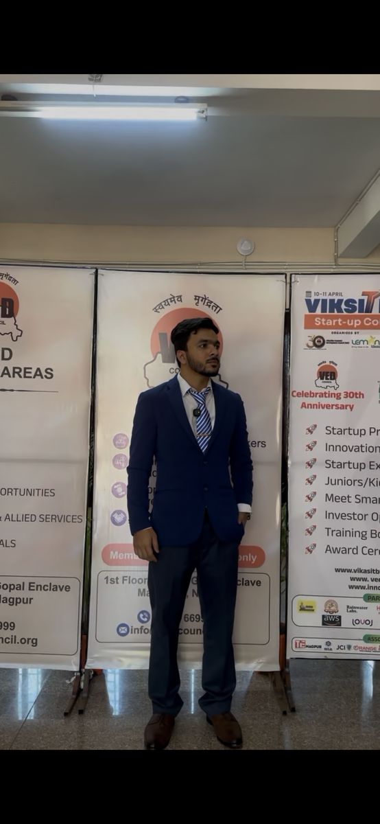 Nilansh Gupta in formal attire at VED Council Viksit Bharat Start-up Conclave Nagpur